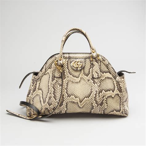 gucci purse with snakeskin trim|gucci clutch bag price list.